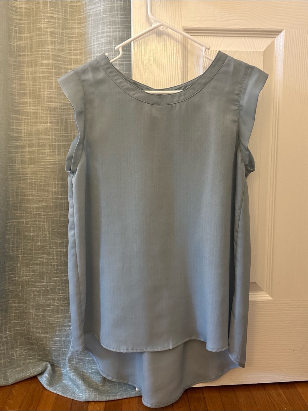 Sleek Light Blue Sleeveless High-Low Tunic